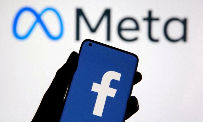 A smartphone with Facebook's logo is seen with new rebrand logo Meta in this illustration taken on Oct. 28, 2021. (Dado Ruvic/Reuters)