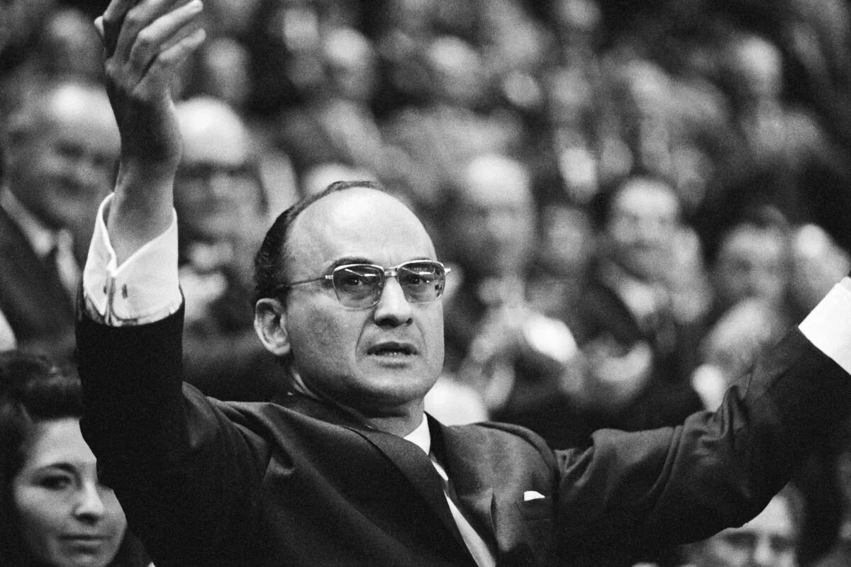 Luis Echeverria Alvarez speaks to party members after becoming the official nominee for the 1970-76 presidential race, during the closing session of the ruling Institutional Revolutionary Party's conventional at the Olympic Sports Palace in Mexico City on Nov. 16, 1969. (AP Photo)