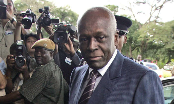 Angola President José Eduardo dos Santos arrives at the Mulungushi International Conference Center in Lusaka, Zambia, on April 12, 2008. Themba Hadebe/AP Photo)