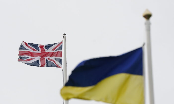 Undated file photo showing a UK flag and a Ukrainian flag. (Owen Humphreys/PA Media)