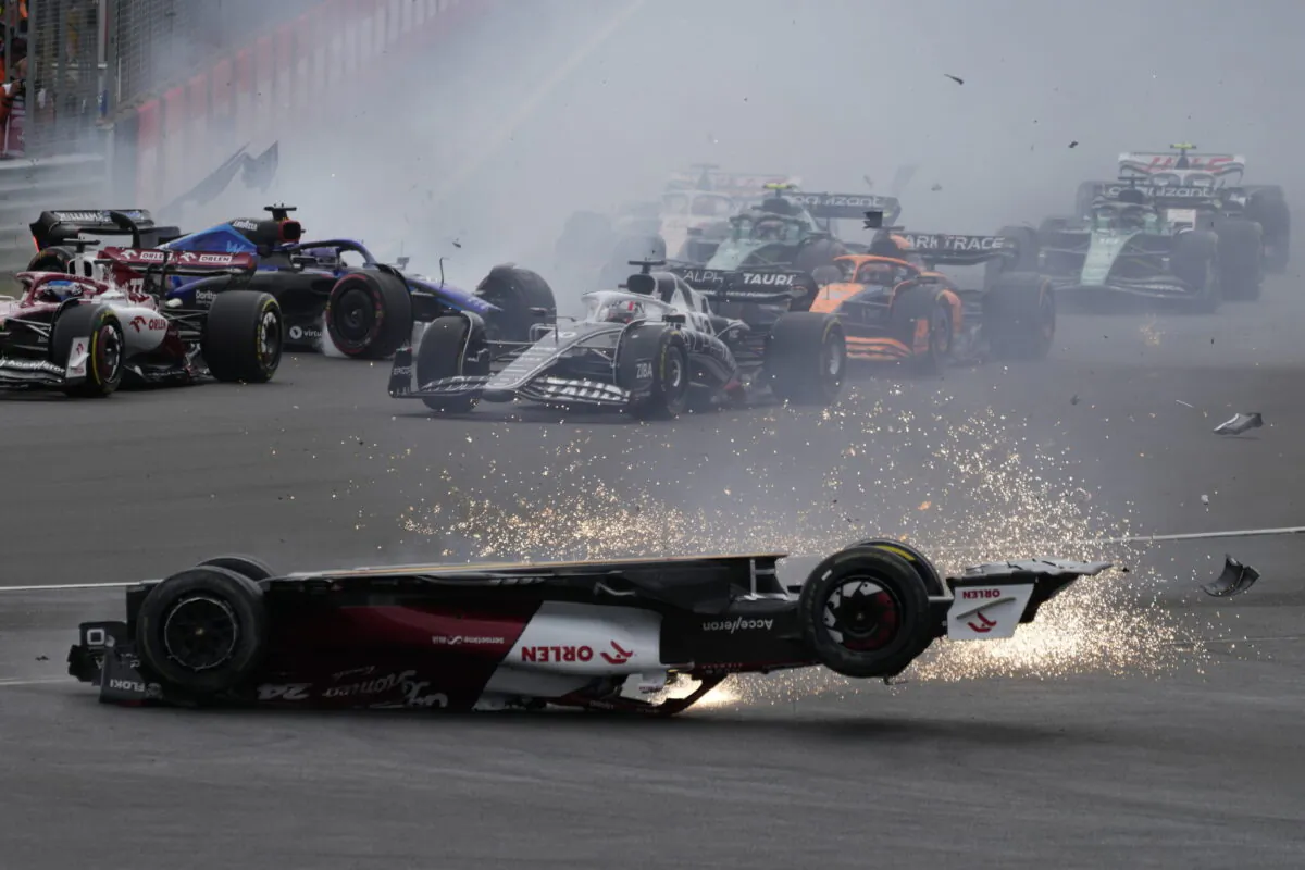 Alfa Romeo driver Guanyu Zhou of China crashes at the start of the British Formula One Grand Prix at the Silverstone circuit in Silverstone, England, on July 3, 2022. (Frank Augstein/AP Photo)