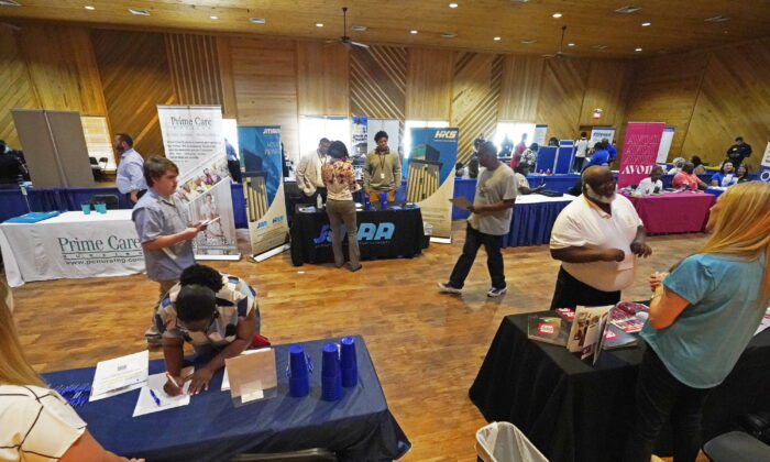 Veterans, the formerly incarcerated, and job seekers wanting to change professions, were invited to attend the 2022 Mississippi Re-Entry Job Fair in Jackson, Miss., on June 22, 2022. (Rogelio V. Solis/AP Photo)