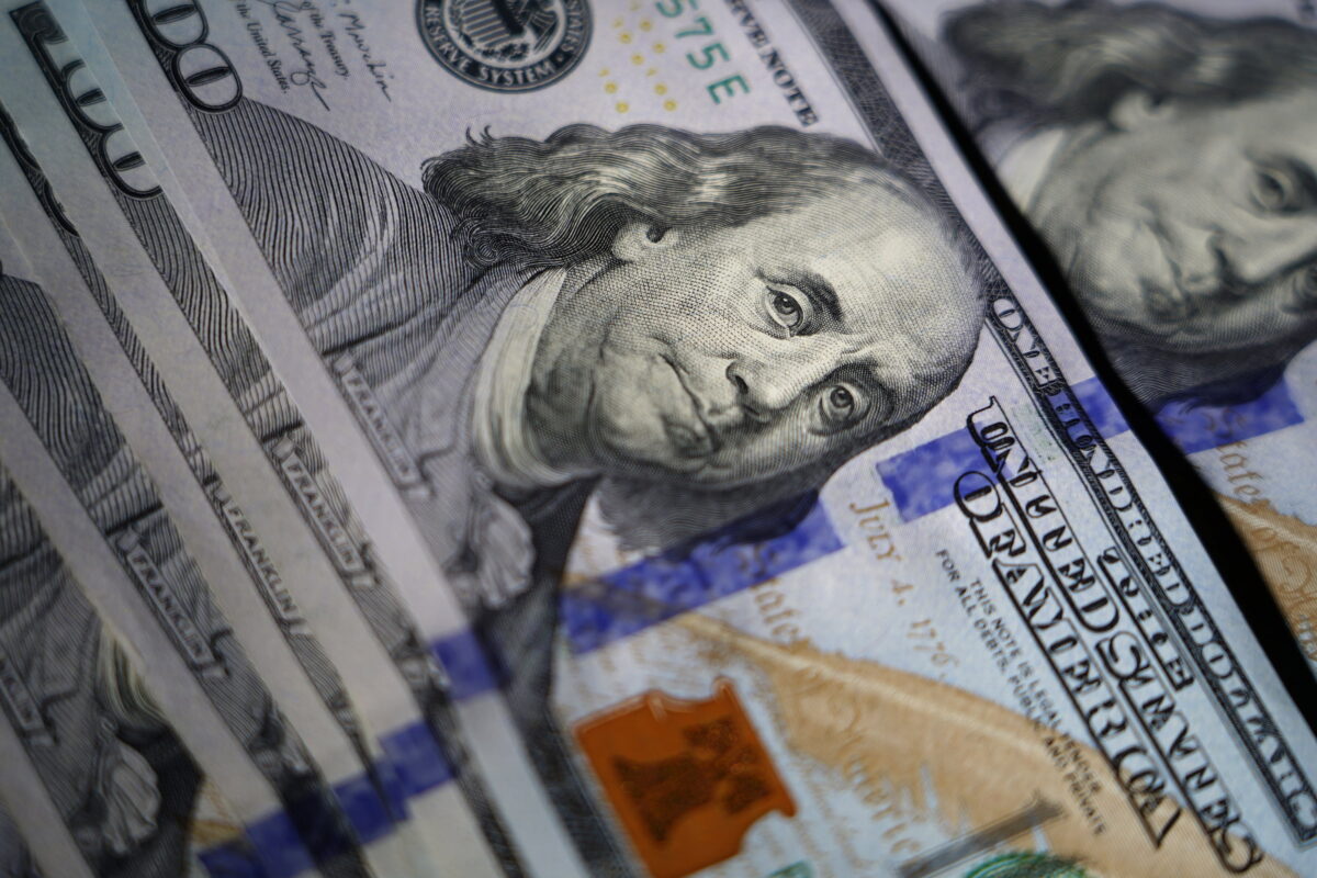 The likeness of Benjamin Franklin is seen on U.S. $100 bills in Marple Township, Pa., on July 14, 2022. (Matt Slocum/AP Photo)