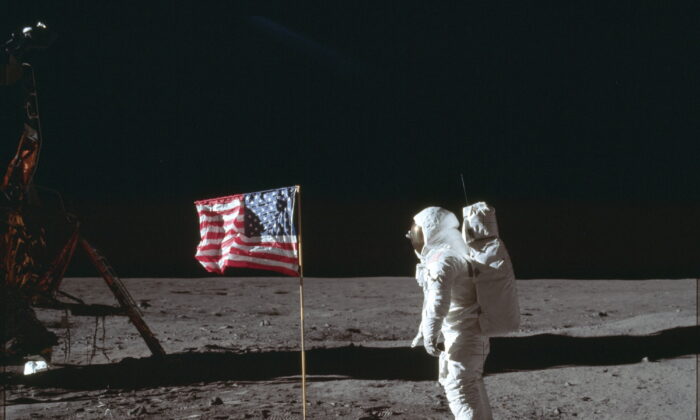 Astronaut Buzz Aldrin Jr. poses for a photograph beside the U.S. flag on the moon on July 20, 1969, during the Apollo 11 mission. (Neil Armstrong/NASA via AP)
