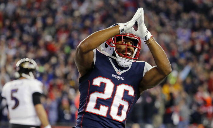 New England Patriots' Logan Ryan signals a safety during the team's NFL football game against the Baltimore Ravens in Foxborough, Mass., on Dec. 12, 2016. (Winslow Townson/AP Photo)