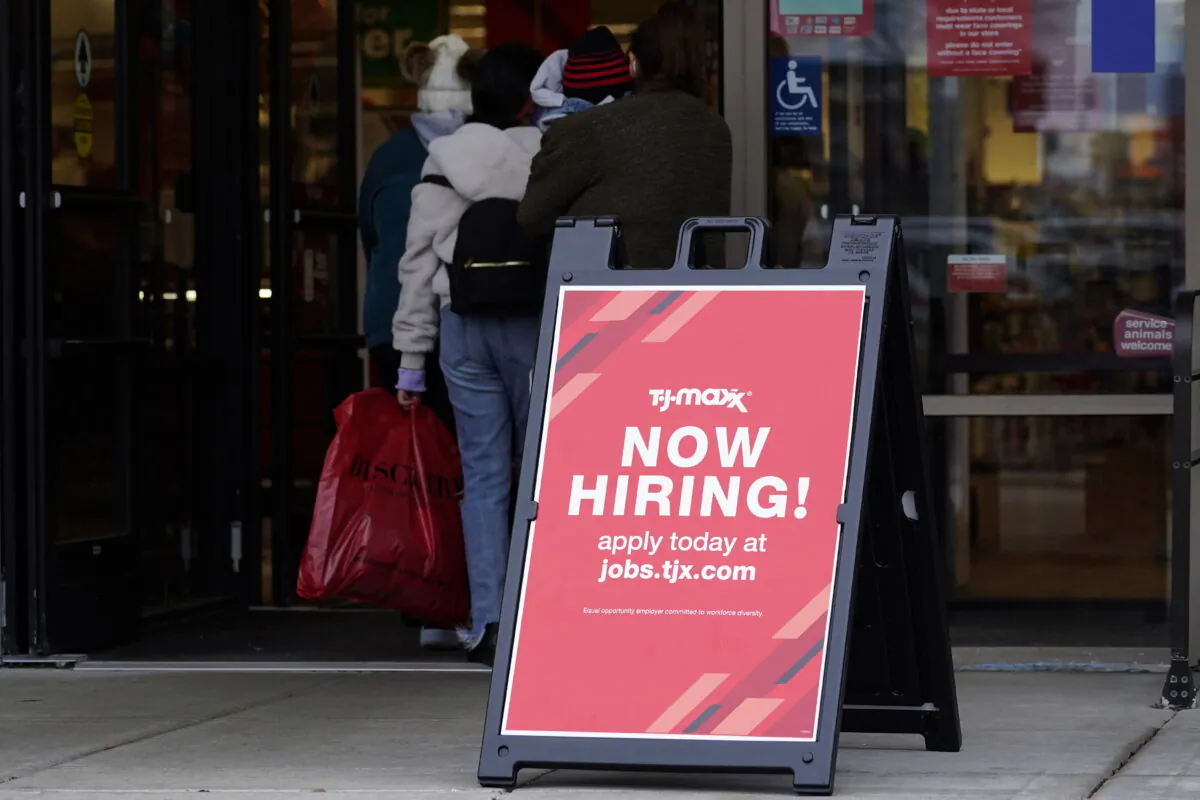 Hiring sign is displayed outside of a retail store in Vernon Hills, Ill., on Nov. 13, 2021. (Nam Y. Huh, File/AP Photo/)