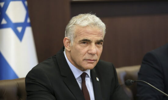 Israel’s Caretaker Prime Minister Lapid Holds First Cabinet Meeting