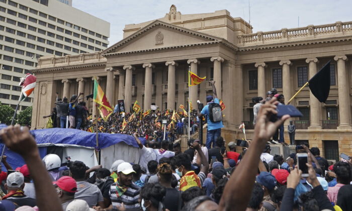 Protesters gather outside the president's office in Colombo, Sri Lanka, on July 9, 2022. (Thilina Kaluthotage/AP Photo)