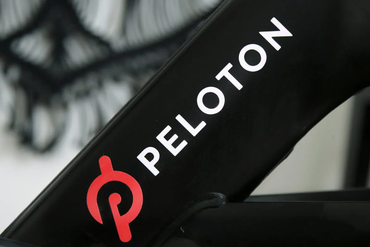 A Peloton logo on the company's stationary bicycle in San Francisco, Calif., on Nov. 19, 2019. (Jeff Chiu/AP Photo)