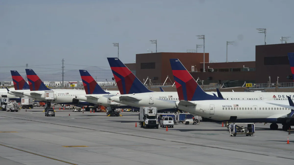 Delta Air Lines planes are shown at their gates at Salt Lake City International Airport in Salt Lake City, on June 30, 2022.  (Rick Bowmer/AP Photo)