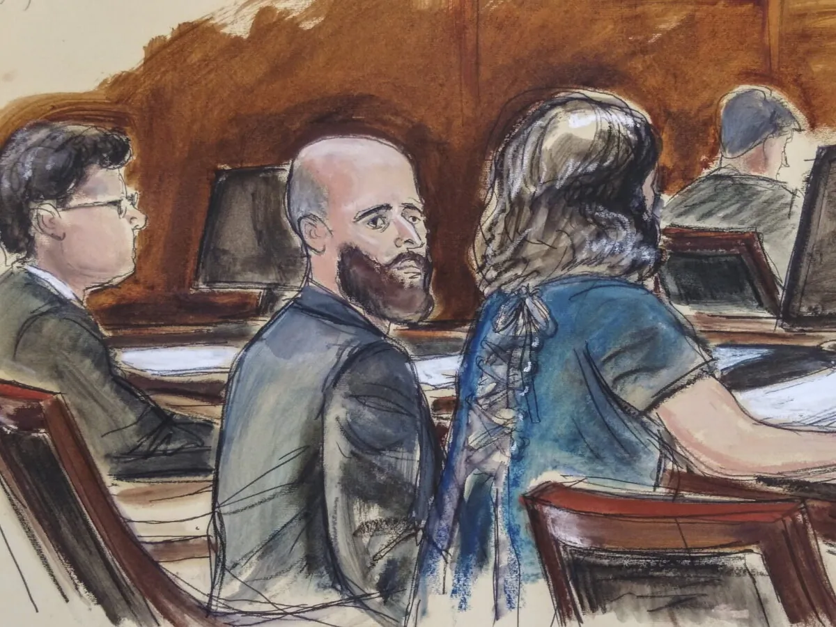 In this courtroom sketch, Joshua Schulte is seated at the defense table flanked by his attorneys during jury deliberations in New York, on March 4, 2020. (Elizabeth Williams via AP)