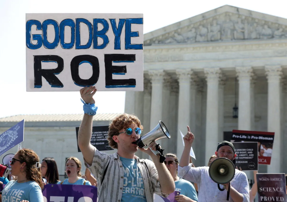 Pro-Life activists demonstrate outside the U.S. Supreme Court in Washington, D.C. in June 2022, days before the Court repealed 1973's Roe v. Wade ruling. (Evelyn Hockstein/Reuters)