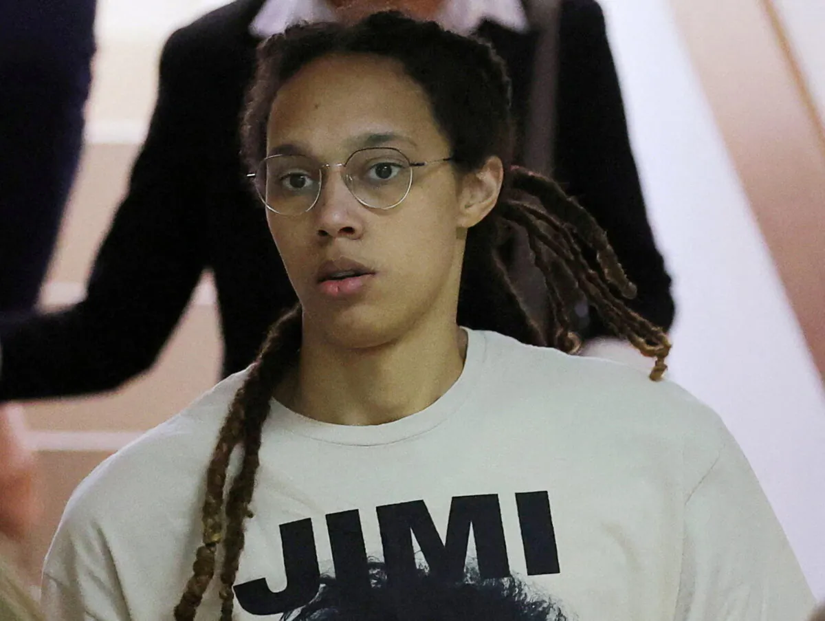 U.S. basketball player Brittney Griner, who was detained in March at Moscow's Sheremetyevo airport and later charged with illegal possession of cannabis, is escorted before a court hearing in Khimki outside Moscow onJuly 1, 2022. (Evgenia Novozhenina/Reuters)