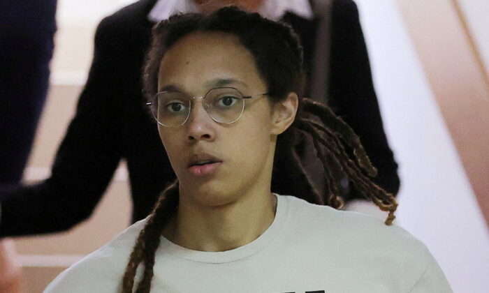 U.S. basketball player Brittney Griner, who was detained in March at Moscow's Sheremetyevo airport and later charged with illegal possession of cannabis, is escorted before a court hearing in Khimki outside Moscow onJuly 1, 2022. (Evgenia Novozhenina/Reuters)