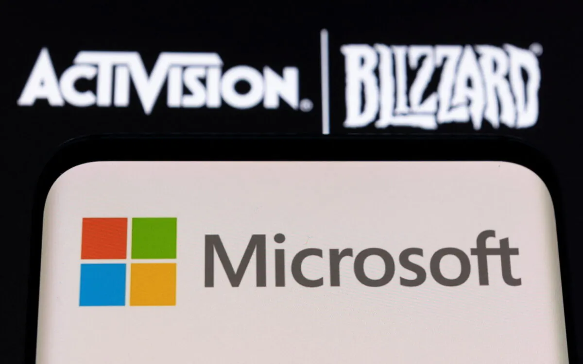 Microsoft logo on a smartphone placed on displayed Activision Blizzard logo in a photo illustration taken on Jan. 18, 2022. (Dado Ruvic/Reuters)