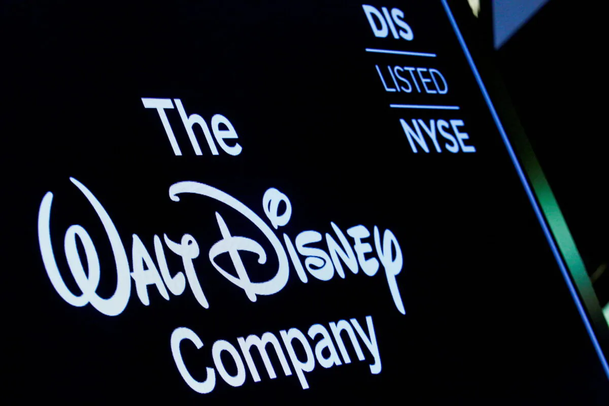 A screen shows the logo and a ticker symbol for The Walt Disney Company on the floor of the New York Stock Exchange (NYSE) in New York, on Dec. 14, 2017. (Brendan McDermid/Reuters)