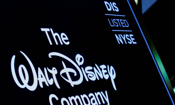 A screen shows the logo and a ticker symbol for The Walt Disney Company on the floor of the New York Stock Exchange (NYSE) in New York, on Dec. 14, 2017. (Brendan McDermid/Reuters)