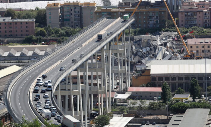 The collapsed Morandi Bridge is seen in the Italian port city of Genoa, Italy on Aug. 16, 2018.  (Stefano Rellandini/Reuters)