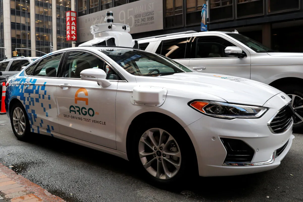 An Argo AI self-driving prototype vehicle is seen outside a Ford and Volkswagen joint news conference in New York on July 12, 2019. (Mike Segar/Reuters)