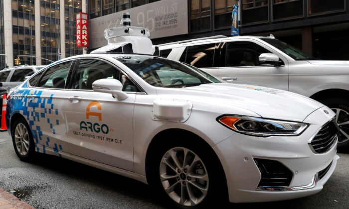 An Argo AI self-driving prototype vehicle is seen outside a Ford and Volkswagen joint news conference in New York on July 12, 2019. (Mike Segar/Reuters)