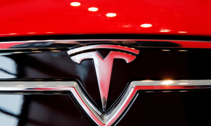 A Tesla logo on a Model S is photographed inside of a Tesla dealership in New York on April 29, 2016. (Lucas Jackson/Reuters)