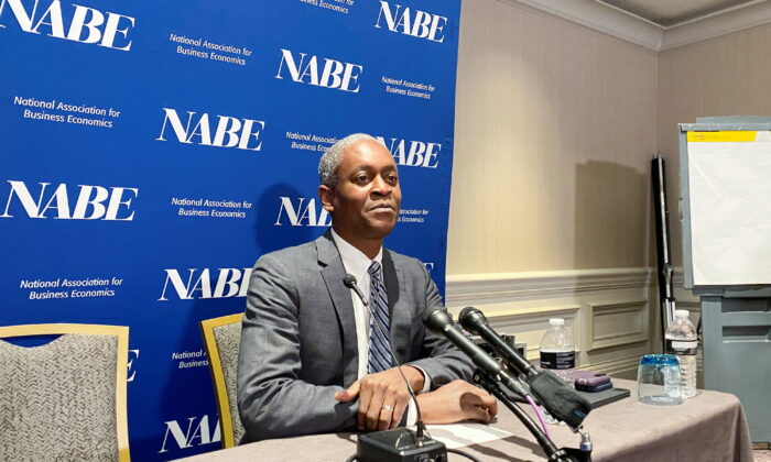Atlanta Federal Reserve Bank President Raphael Bostic speaks to reporters at the National Association of Business Economics' annual policy meeting in Wash., on March 21, 2022. (Ann Saphir/Reuters)