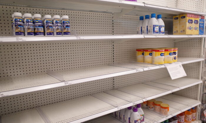 Similac and Enfamil products on largely empty shelves in the baby formula section of a Target store, amid continuing nationwide shortages in infant and toddler formula, in San Diego, on May 25, 2022. (Bing Guan/Reuters)