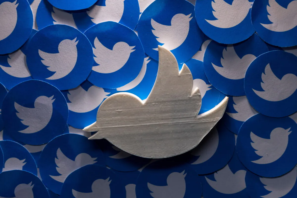 A 3D-printed Twitter logo on non-3D printed Twitter logos is seen in this picture illustration taken on April 28, 2022. (Dado Ruvic/Reuters)