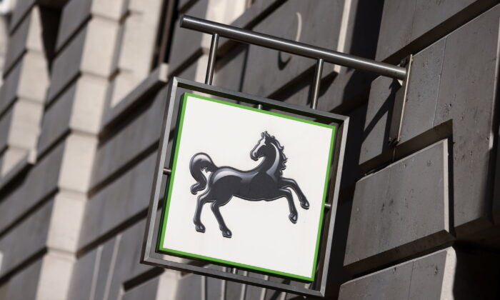 Signage at a branch of Lloyds bank in London on Oct. 31, 2021. (Tom Nicholson/Reuters)