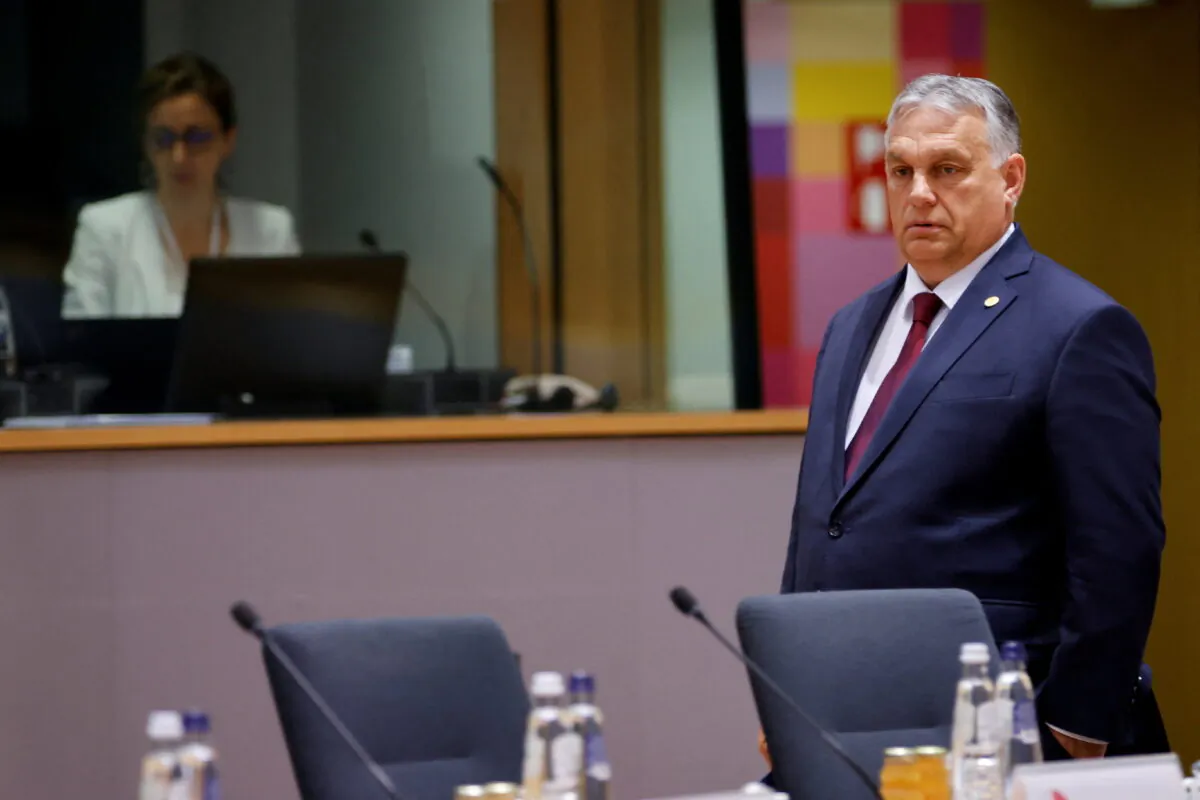Hungarian Prime Minister Viktor Orban walks at a main meeting room ahead of European Union leaders summit in Brussels, Belgium, on June 23, 2022. (Johanna Geron/Reuters)