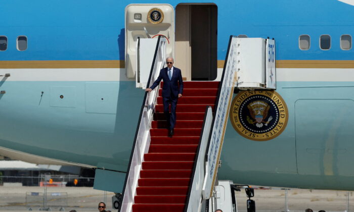 U.S. President Joe Biden descends from Air Force One at Ben Gurion International Airport in Lod, near Tel Aviv, Israel, on July 13, 2022. (Ammar Awad/Reuters)