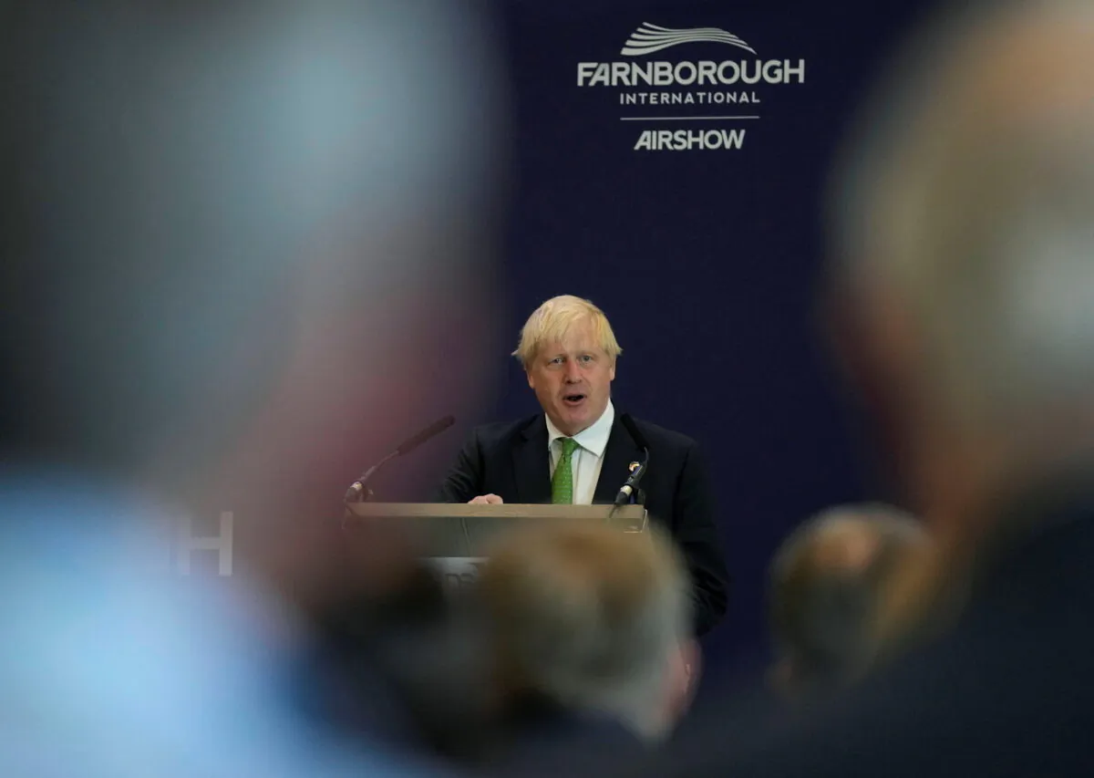 Britain's Prime Minister Boris Johnson speaks as he attends the Farnborough International Airshow, in Farnborough, Britain, on July 18, 2022. (Frank Augstein/Pool via Reuters)