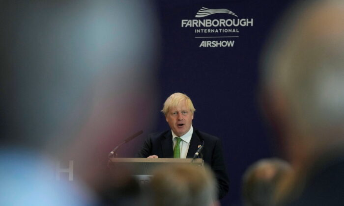 British Prime Minister Boris Johnson will speak at the Farnborough International Air Show on July 18, 2022 in Farnborough, England.  (Pool via Frank Augustaine / Reuters)
