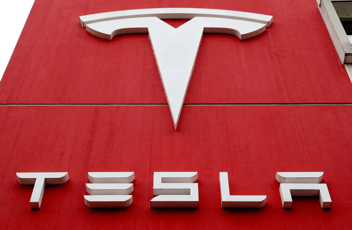 The logo of car manufacturer Tesla at a branch office in Bern, Switzerland, on Oct. 28, 2020. (Arnd Wiegmann/Reuters)