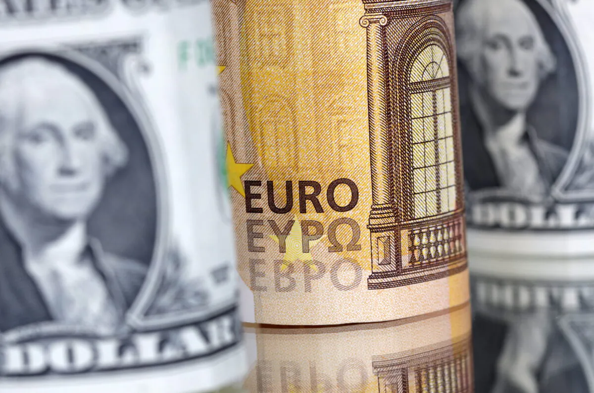 U.S. dollar and euro banknotes are seen in this illustration taken on July 17, 2022. (Dado Ruvic/Reuters)