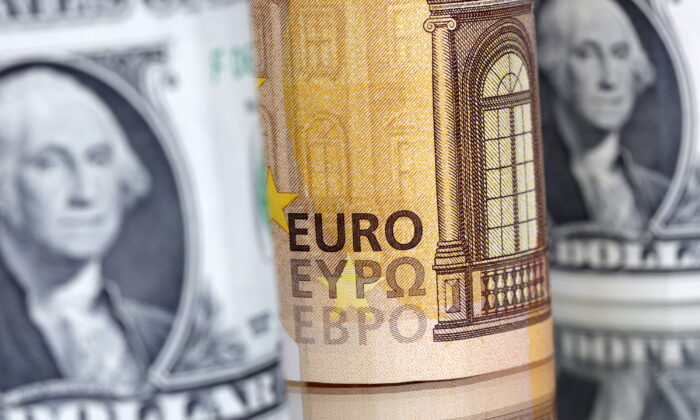 U.S. Dollar and Euro banknotes are seen in this illustration taken on July 17, 2022. (Dado Ruvic/Illustration/Reuters)