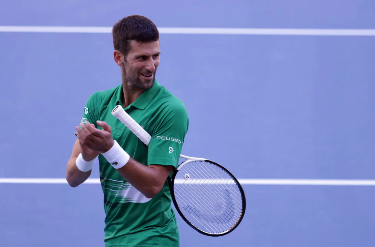 Serbian tennis player Novak Djokovic performs during the opening of a regional tennis center that will prepare top tennis players for major tournaments, in Visoko, Bosnia and Herzegovina, on July 13, 2022. (Dado Ruvic/Reuters)