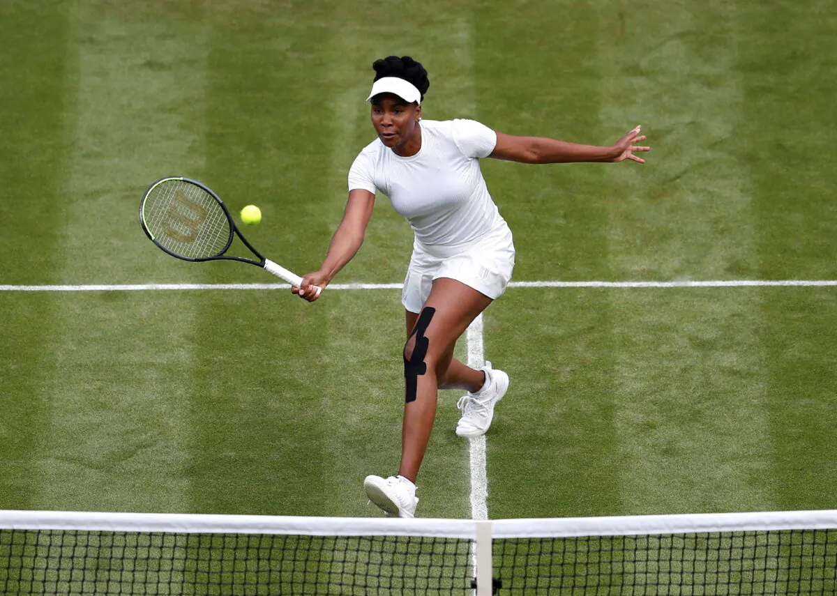 Venus Williams of the United States in action during her second round match against Tunisia's Ons Jabeur at the Wimbledon Championships in London on June 30, 2021. (Peter Nicholls/Reuters)