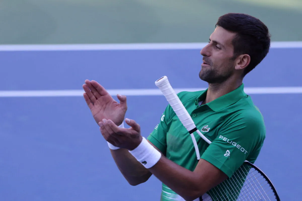 Serbian tennis player Novak Djokovic performs during the opening of a regional tennis center that will prepare top tennis players for major tournaments, in Visoko, Bosnia and Herzegovina, on July 13, 2022. (Dado Ruvic/Reuters)