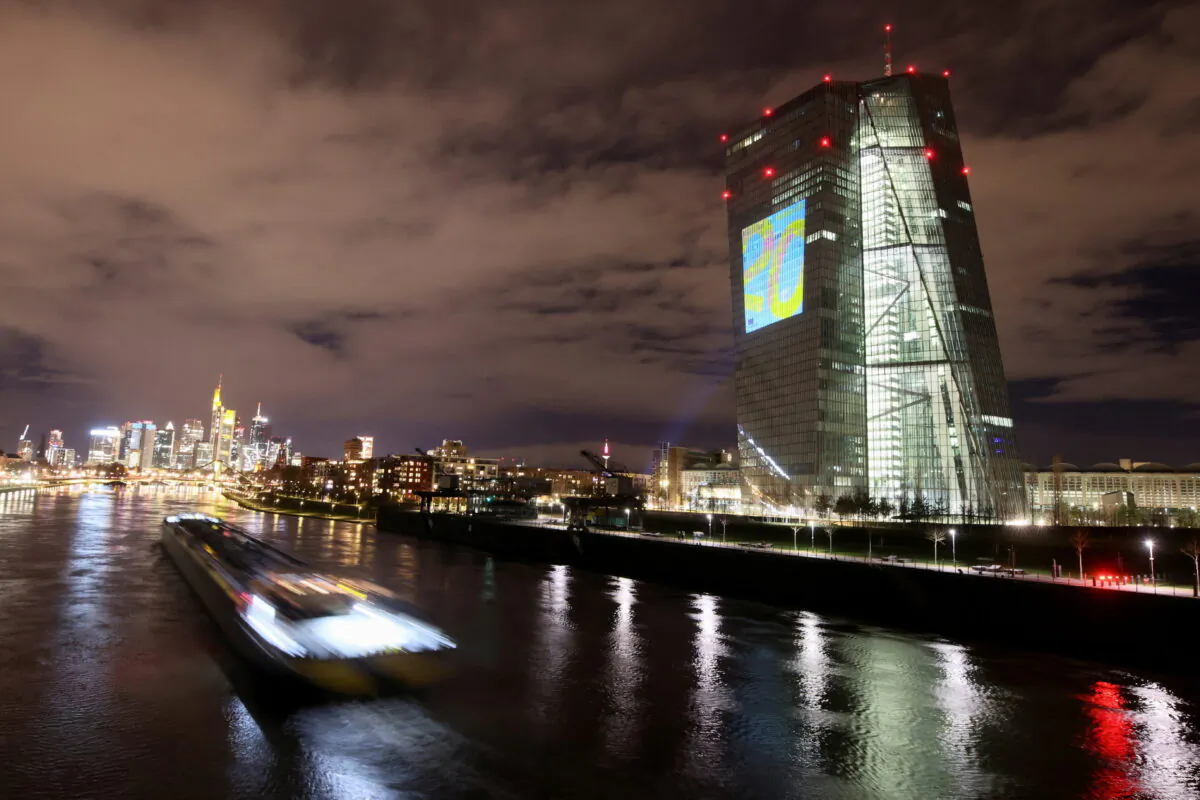 A symphony of light illuminates the south facade of the European Central Bank headquarters in Frankfurt, Germany, on Dec. 30, 2021. (Wolfgang Rattay/Reuters)