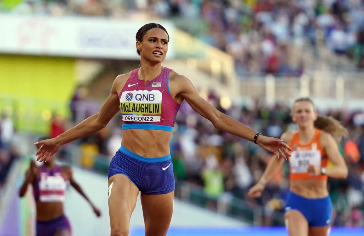 Sydney McLaughlin of the U.S. crosses the line to win the women's 400 meters hurdles final and set a world record on day eight of the World Athletics Championships Oregon22 at Hayward Field in Eugene, Ore., on July 22, 2022. (Lucy Nicholson/Reuters)