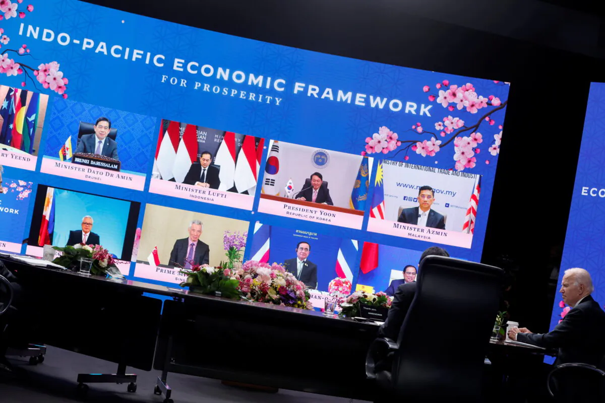 U.S. President Joe Biden listens to other leaders joining the Indo-Pacific Economic Framework for Prosperity (IPEF) launch event virtually, at Izumi Garden Gallery in Tokyo, Japan, on May 23, 2022. (Jonathan Ernst/Reuters)