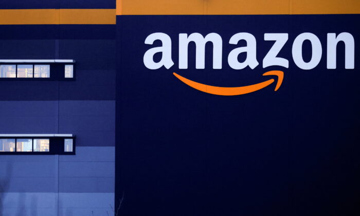 The logo of Amazon is seen at the company's logistics center in Bretigny-sur-Orge, near Paris, on Dec. 7, 2021. (Gonzalo Fuentes/Reuters)