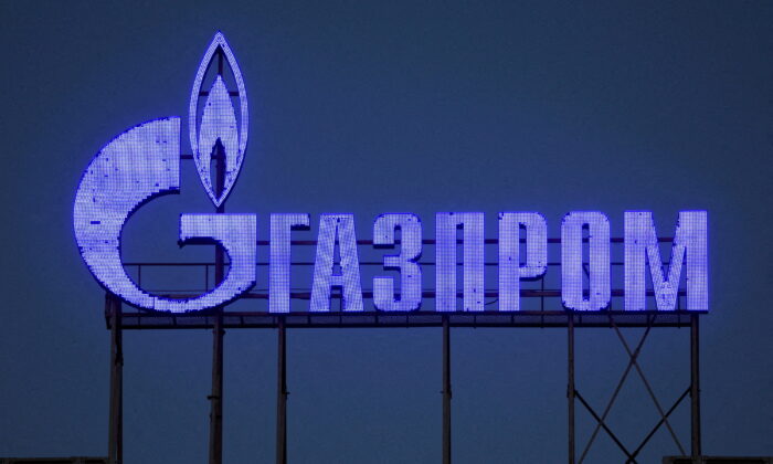 The logo of Gazprom is seen on the facade of a business center in Saint Petersburg, Russia, on March 31, 2022. (Reuters photographer/Reuters)