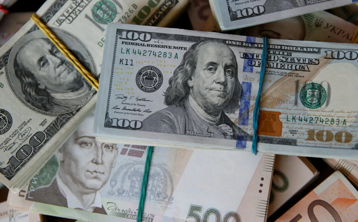 U.S. dollar, euro, and Ukrainian hryvnia banknotes are seen in this picture illustration taken in Kyiv, Ukraine, on Oct. 31, 2016. (Valentyn Ogirenko/Reuters)