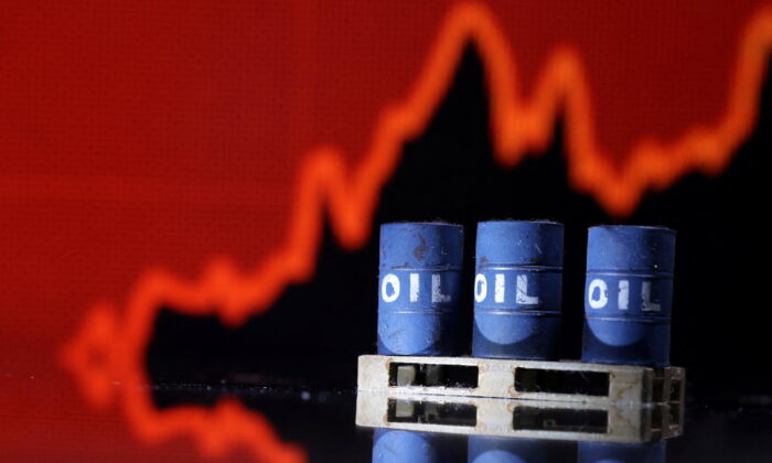 Model of Oil barrels are seen in front of rising stock graph in this illustration, on July 24, 2022. (Dado Ruvic/Illustration/Reuters)
