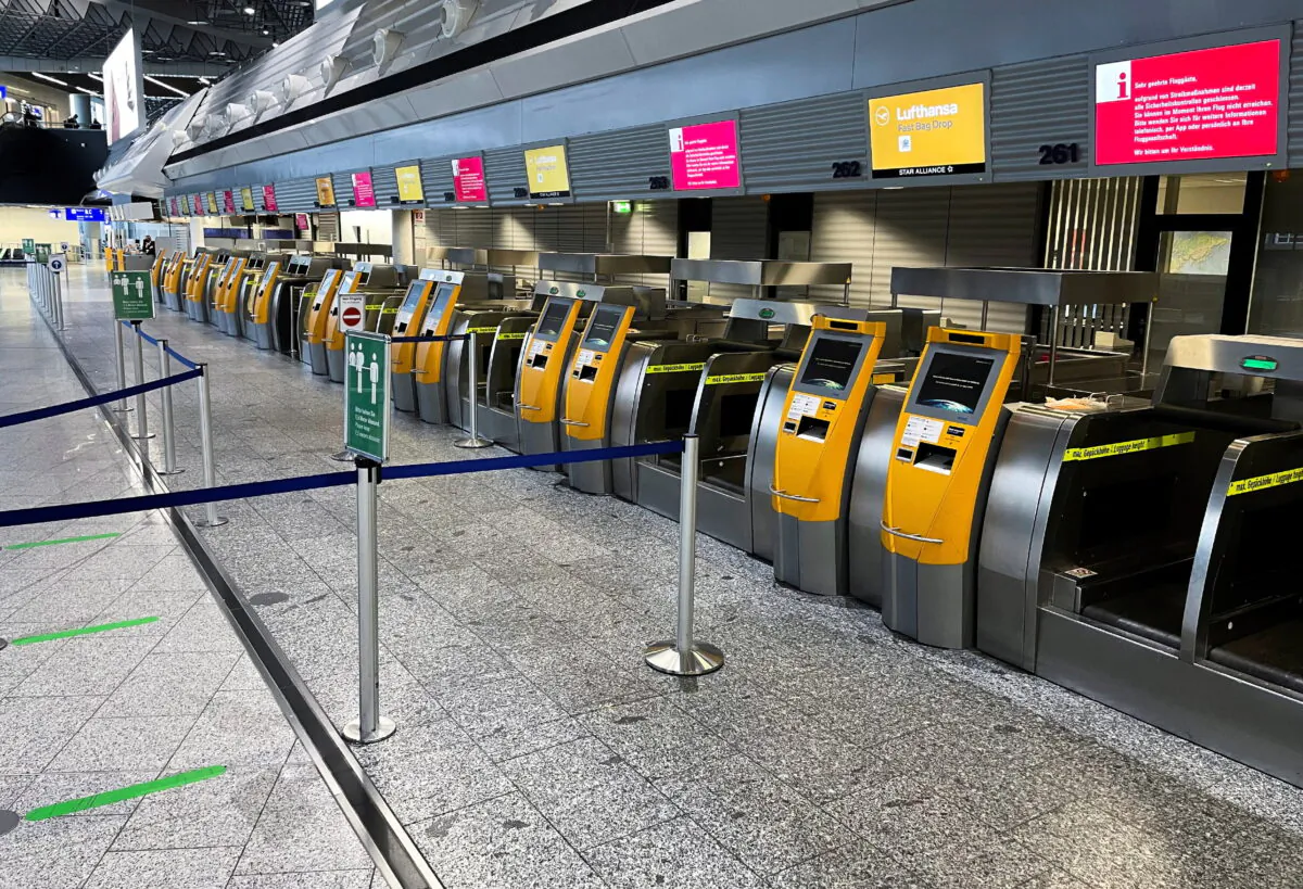 Empty counters of German airline Lufthansa at Frankfurt Airport during a strike of security staff at various German airports on March 15, 2022. (Timm Reichert/Reuters)
