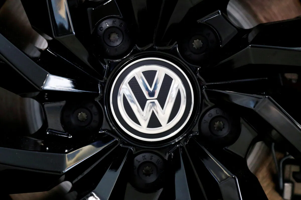The logo of German carmaker Volkswagen on a rim cap in a showroom of a Volkswagen car dealer in Brussels on July 9, 2020. (Francois Lenoir/Reuters)