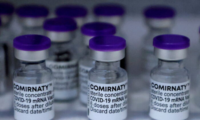Vials of the Pfizer-BioNTech Comirnaty coronavirus disease (COVID-19) vaccine are pictured in a General practitioners practice in Berlin, Germany, on April 10, 2021. (Fabrizio Bensch/Reuters)