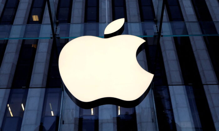 The Apple Inc. logo hanging astatine  the entranceway  to the Apple store   connected  5th Avenue successful  Manhattan, New York, connected  Oct. 16, 2019. (Mike Segar/Reuters)